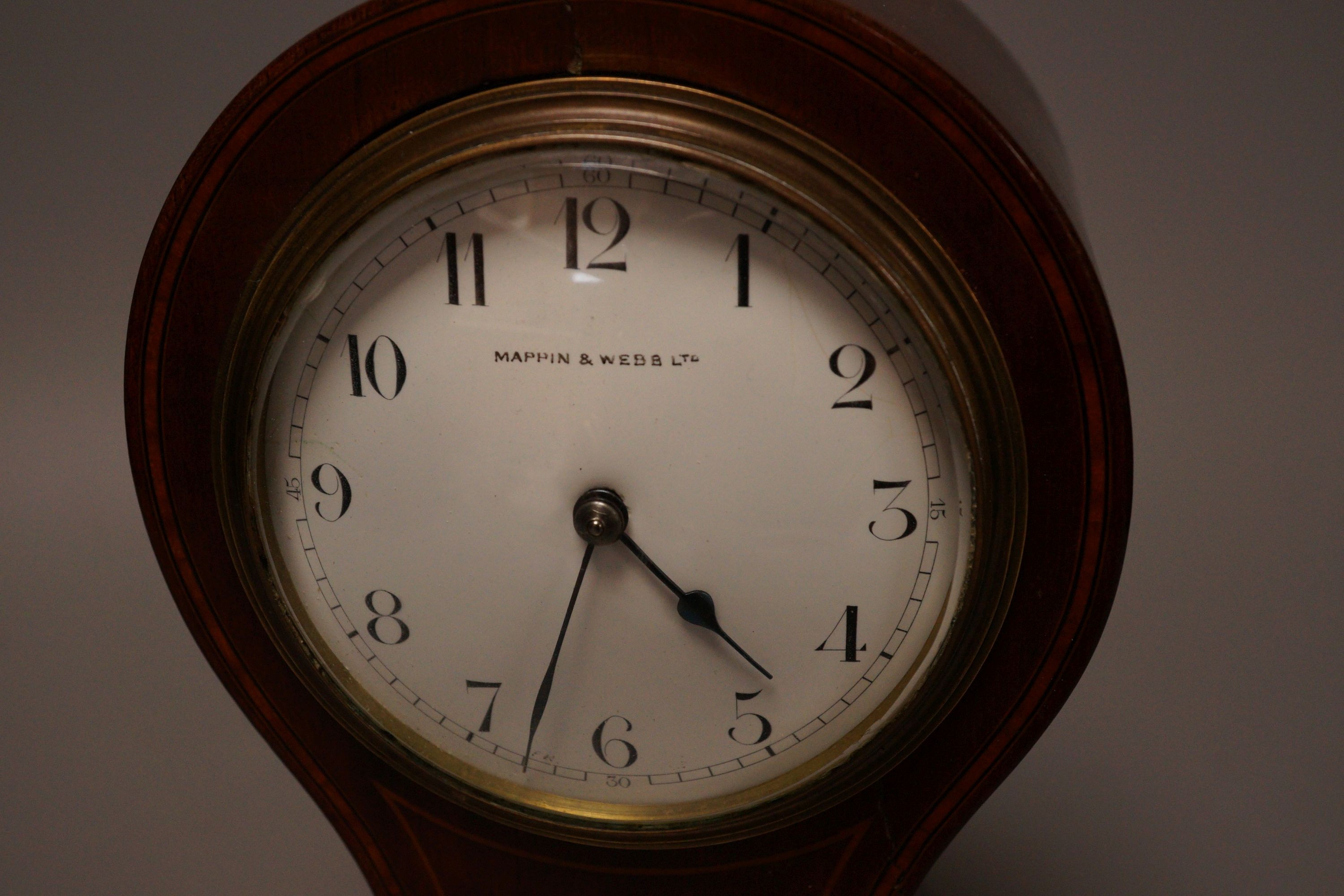 A Mappin & Webb mahogany mantel clock, 26cm tall